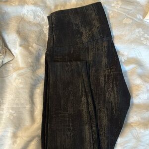 Lysee size Large foil looking legging.  Never worn.  Tight fit